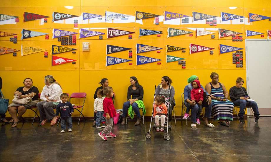 parents wait to sign up for the KIPP charter school