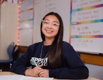 Young girl In Blue KIPP Texas Uniform Inside