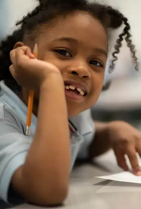 Young Girl Learning to Write at KIPP Texas Public School