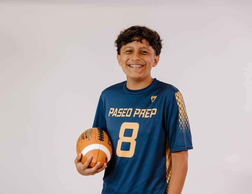 KIPP Texas Athlete-Holding-a-Football