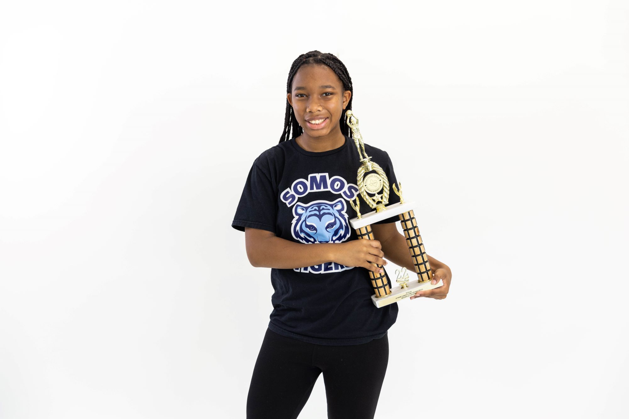 KIPP Texas High School Student Holding A Trophy