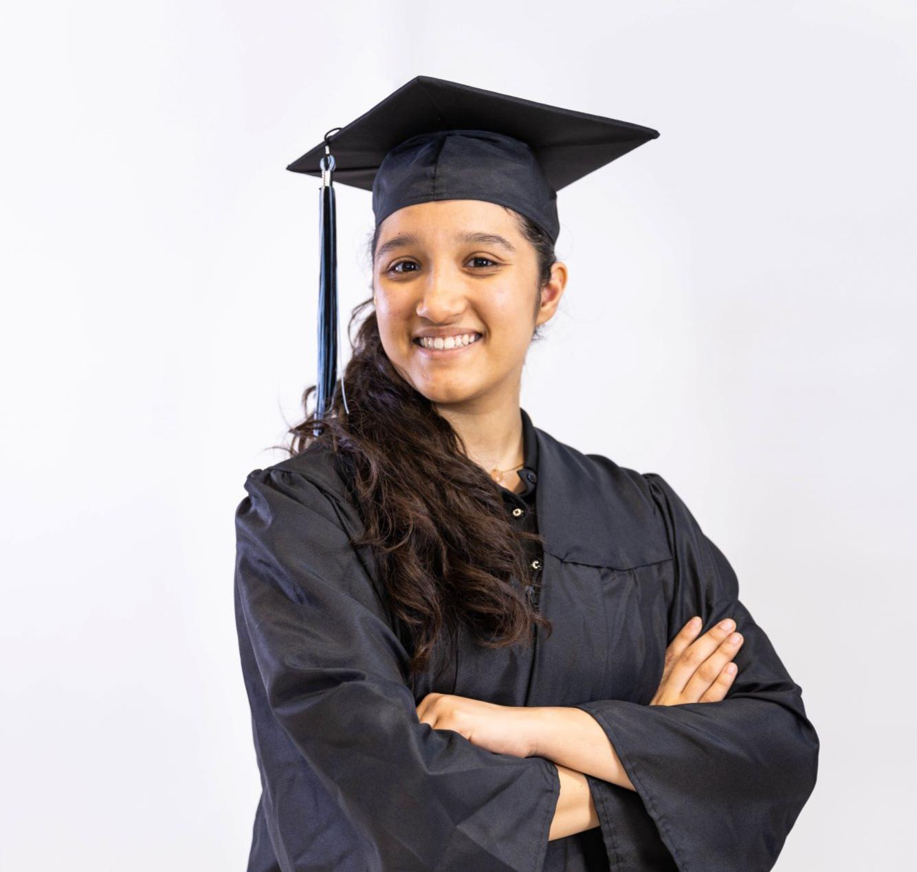 KIPP Texas High School Student Wearing Cap and Gown