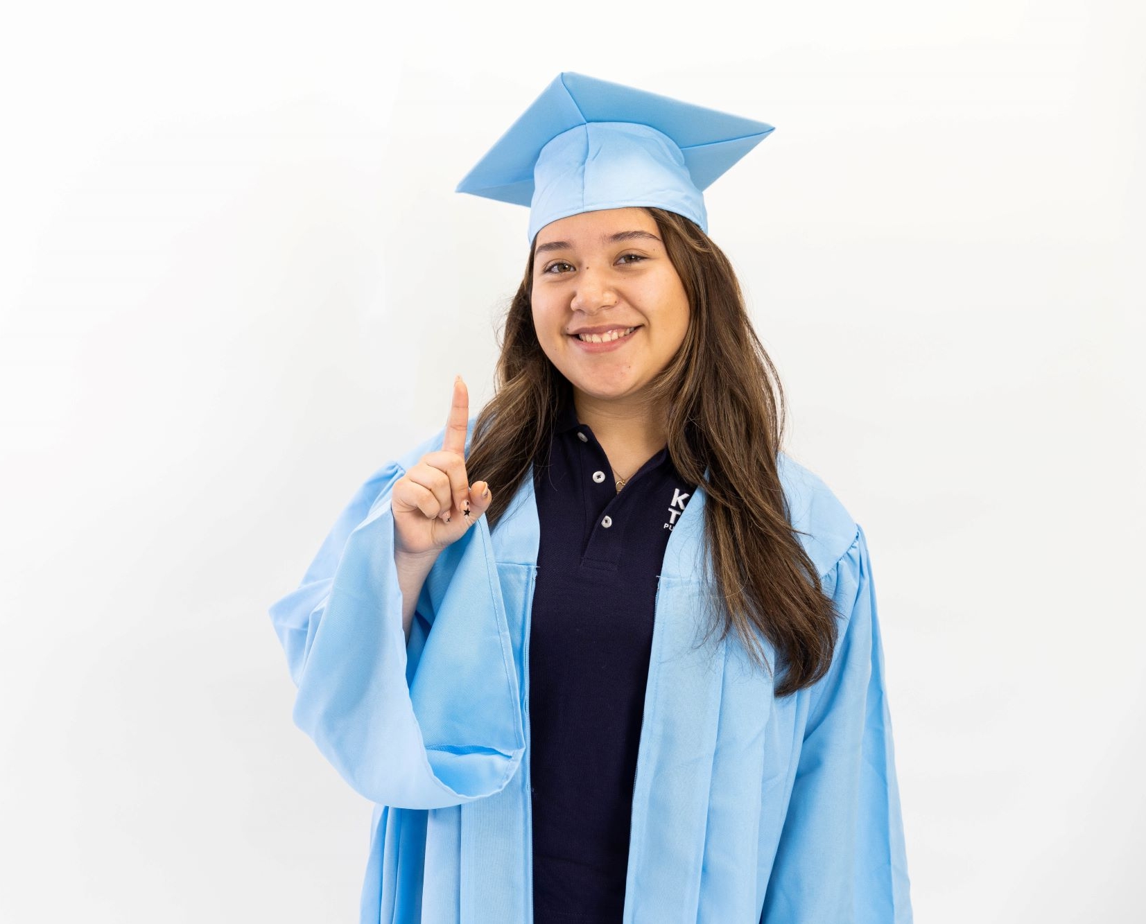 KIPP Texas High School Senior with Cap and Gown