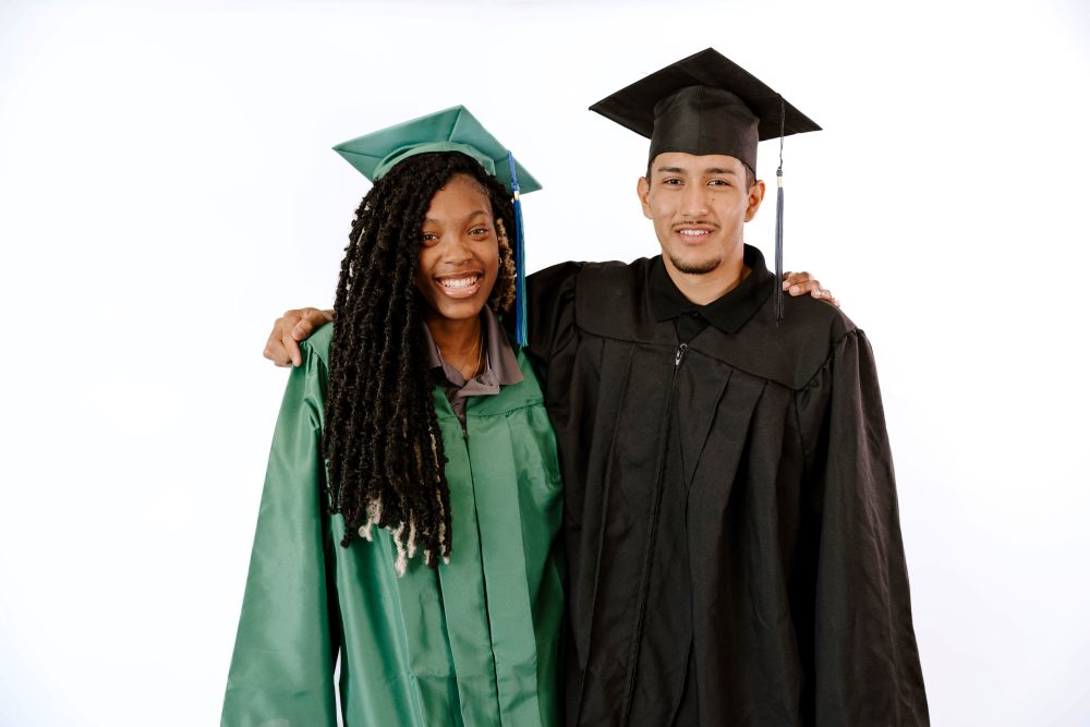 Two KIPP Texas High School Students in Cap and Gown
